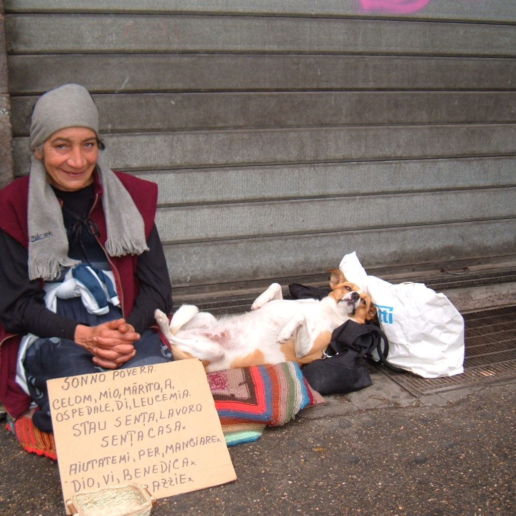A gipsy woman with her dog