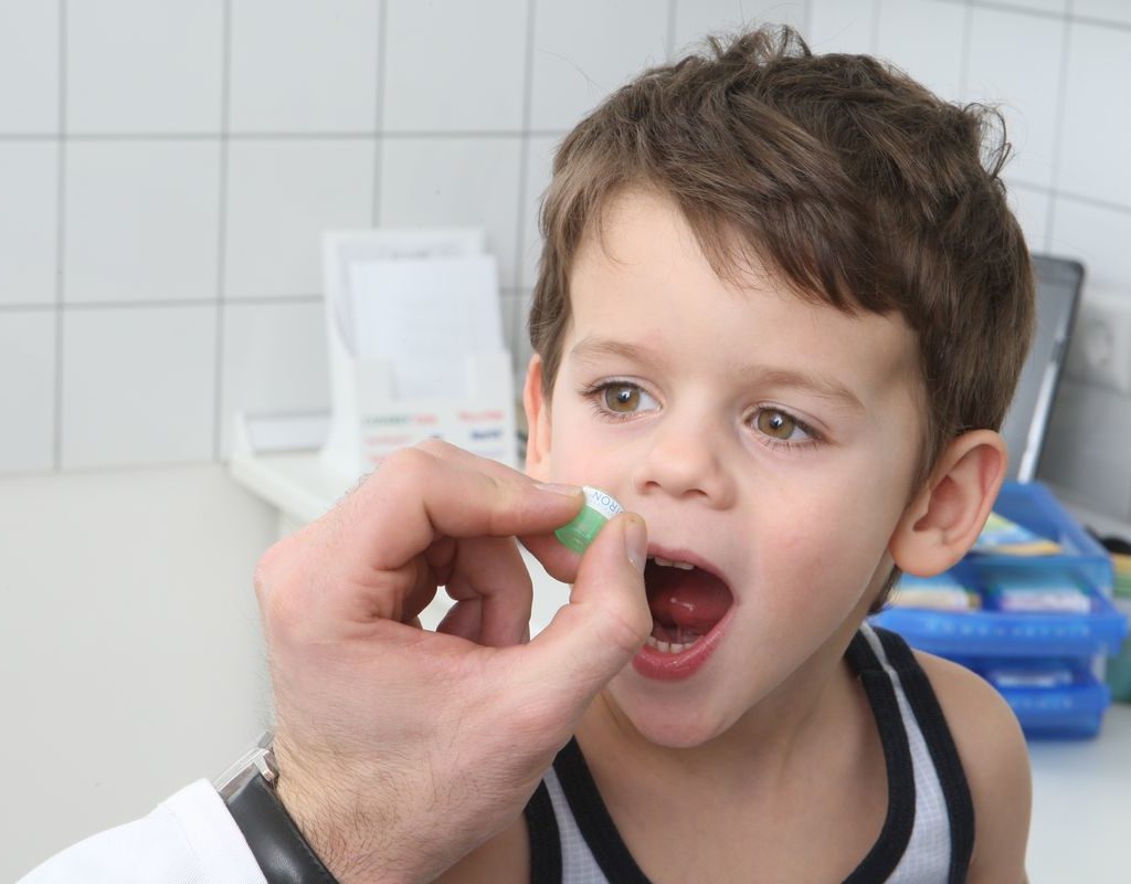 child takes remedy